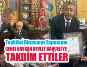 Teşkilat binasının tapusunu Genel Başkan Devlet Bahçeli’ye takdim ettiler…