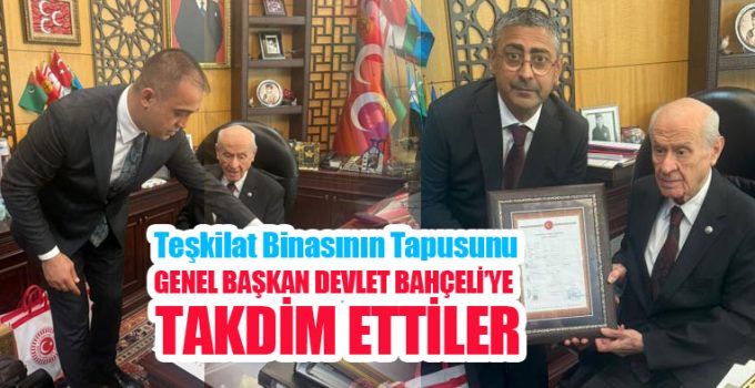 Teşkilat binasının tapusunu Genel Başkan Devlet Bahçeli’ye takdim ettiler…
